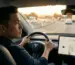 Tesla car driving on a multi-lane highway at golden hour, editorial magazine photography, natural light streaming throug